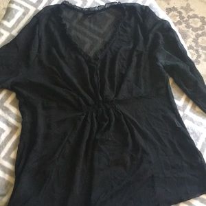 Sheer black blouse